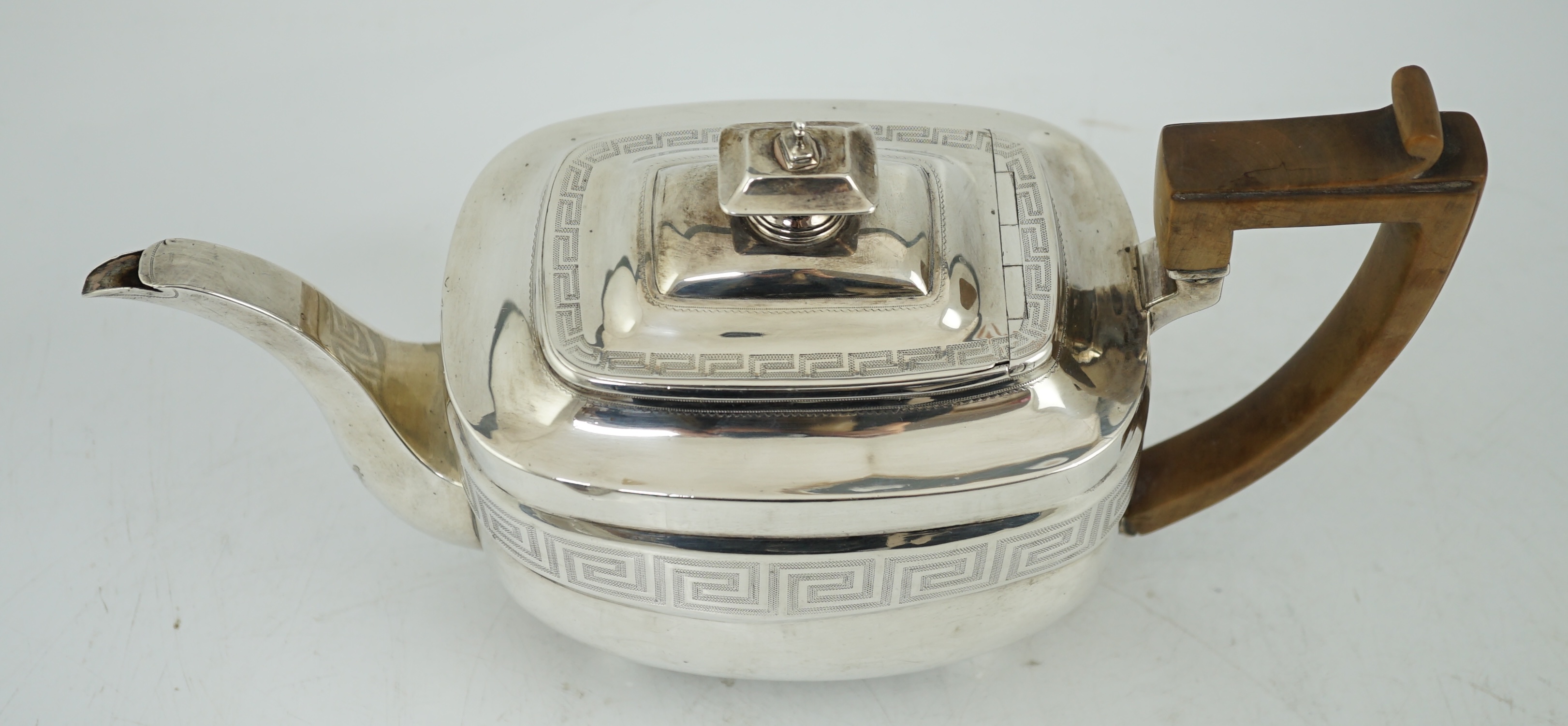 A George III silver shaped rectangular teapot, by Soloman Hougham,`